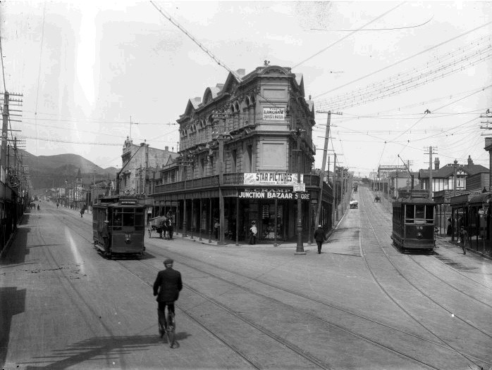 The corner of Riddiford and Rintoul Streets, c1912, with the wedge shaped Ashleigh Court Private Hotel between two trams.  Image: National Library reference 