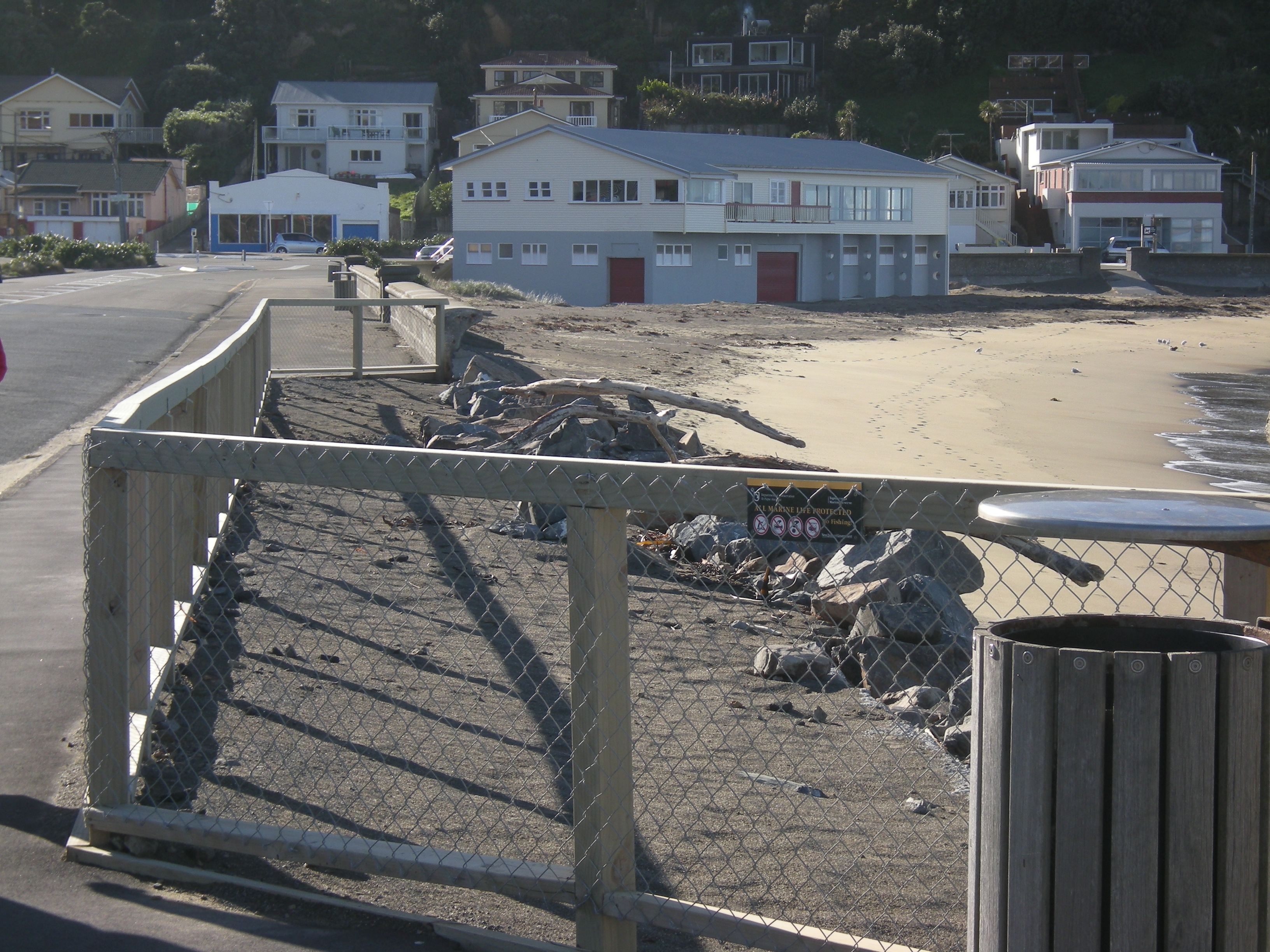 Island Bay sea wall with storm damaged section in the foreground. Image: WCC, 2014