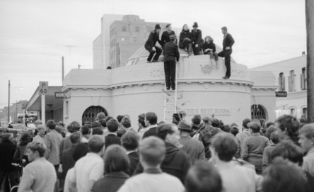 Victoria University students on roof of Taj Mahal, Courtenay Place, Wellington. Further negatives of the Evening Post newspaper. Ref: EP/1967/2436/29A-F. Alexander Turnbull Library, Wellington, New Zealand. http://natlib.govt.nz/records/23199078